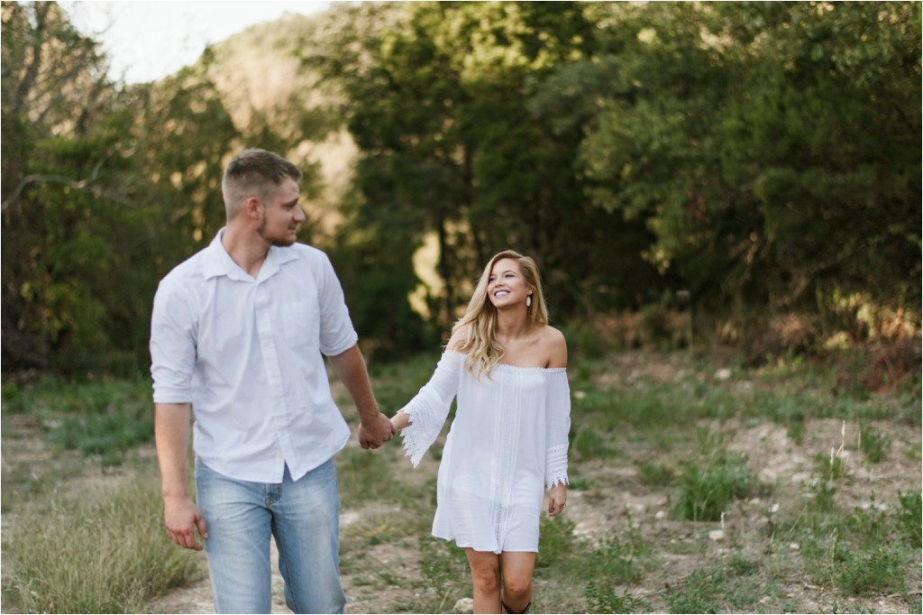 michele-and-jeff-engagement-session-photos-austin-texas-outdoor-sunset-cowboy-boots-lace-dress-fun-romantic-natural-sweet-fun_0001