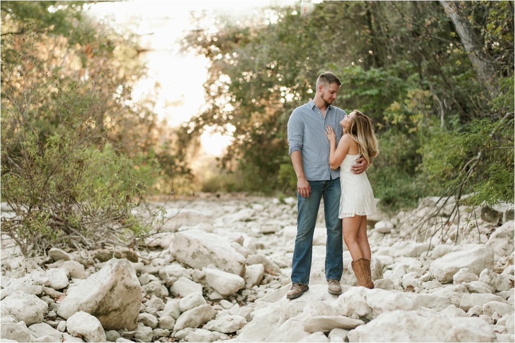 michele-and-jeff-engagement-session-photos-austin-texas-outdoor-sunset-cowboy-boots-lace-dress-fun-romantic-natural-sweet-fun_0010
