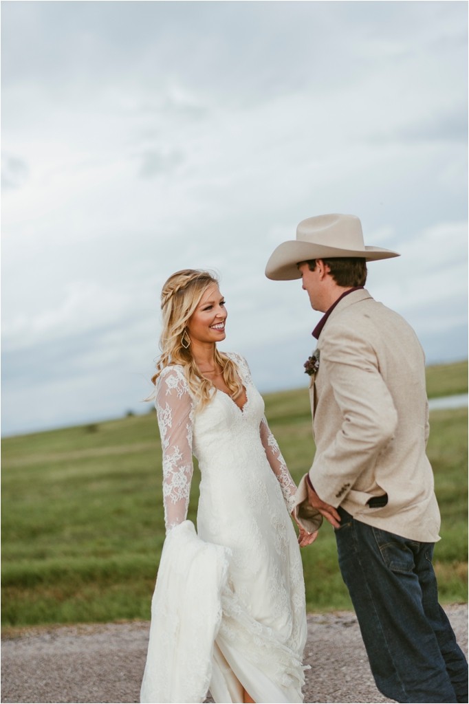 kelsey-and-cole-rustic-chic-wedding-austin-texas-lace-dress-bohemian-bouquet-cowboy-boots-barn-reception_0039