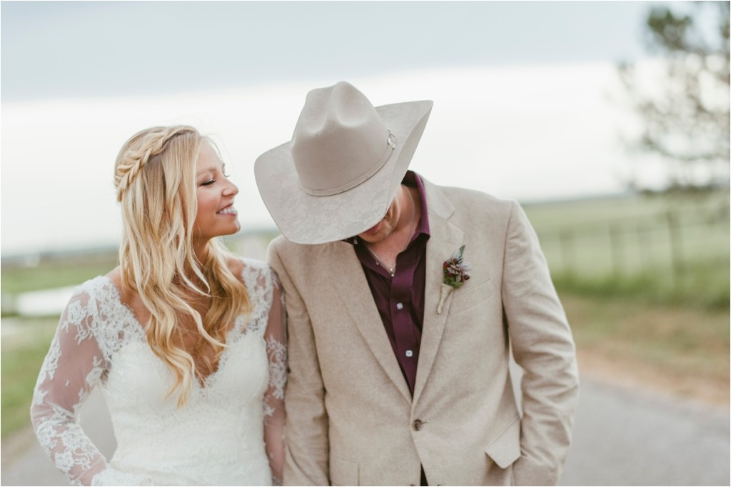 kelsey-and-cole-rustic-chic-wedding-austin-texas-lace-dress-bohemian-bouquet-cowboy-boots-barn-reception_0044