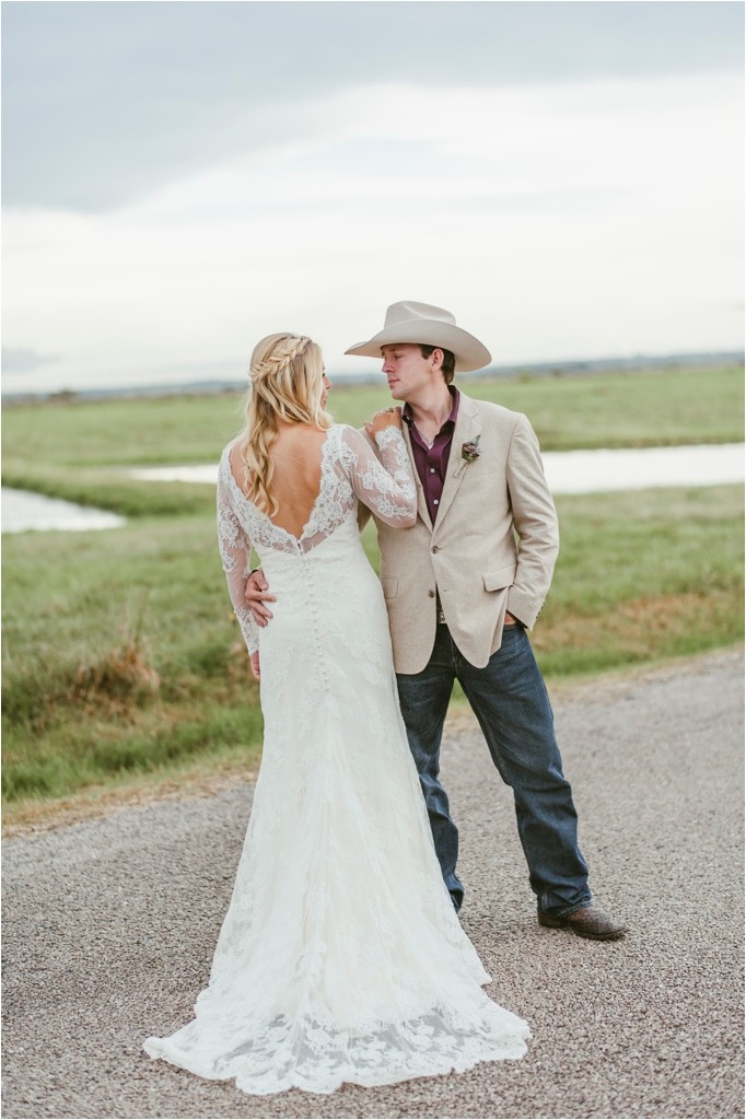 kelsey-and-cole-rustic-chic-wedding-austin-texas-lace-dress-bohemian-bouquet-cowboy-boots-barn-reception_0045