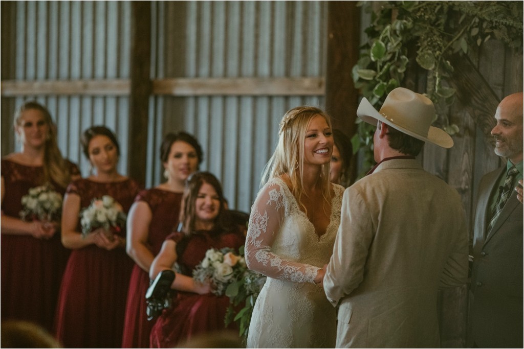 kelsey-and-cole-rustic-chic-wedding-austin-texas-lace-dress-bohemian-bouquet-cowboy-boots-barn-reception_0051