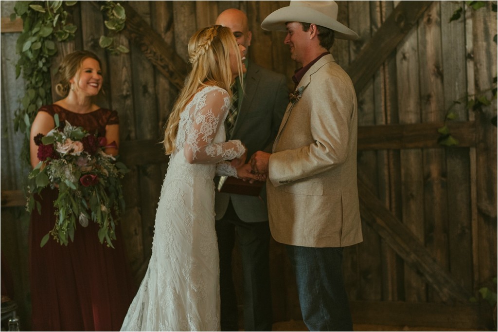 kelsey-and-cole-rustic-chic-wedding-austin-texas-lace-dress-bohemian-bouquet-cowboy-boots-barn-reception_0052