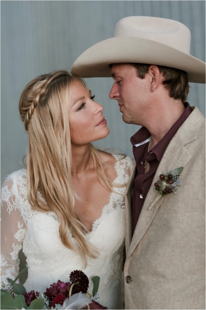 kelsey-and-cole-rustic-chic-wedding-austin-texas-lace-dress-bohemian-bouquet-cowboy-boots-barn-reception_0054