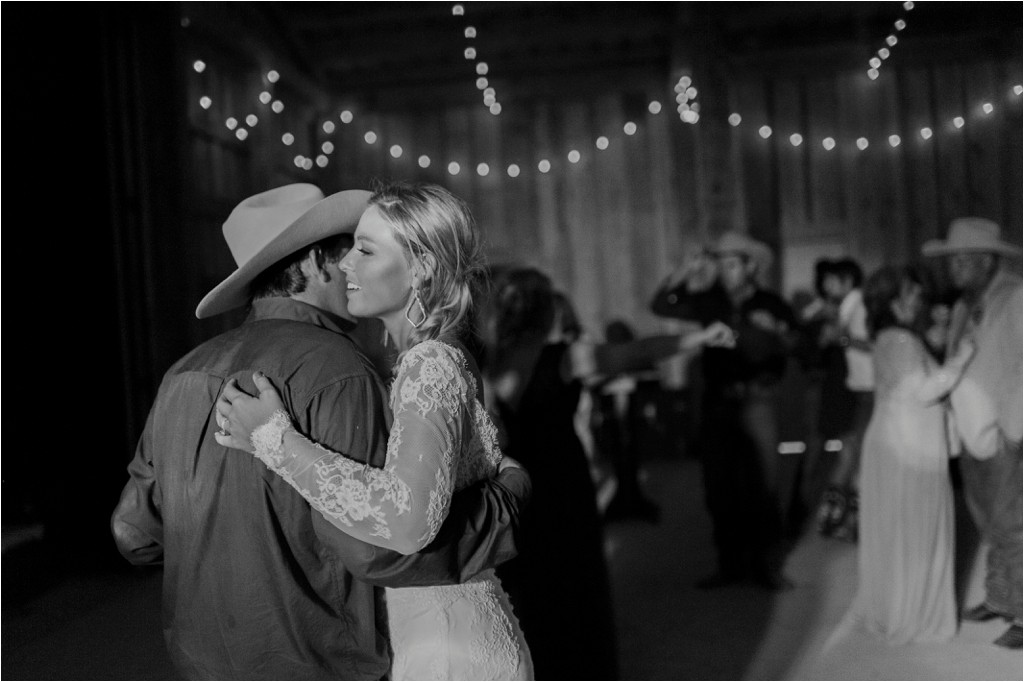 kelsey-and-cole-rustic-chic-wedding-austin-texas-lace-dress-bohemian-bouquet-cowboy-boots-barn-reception_0063